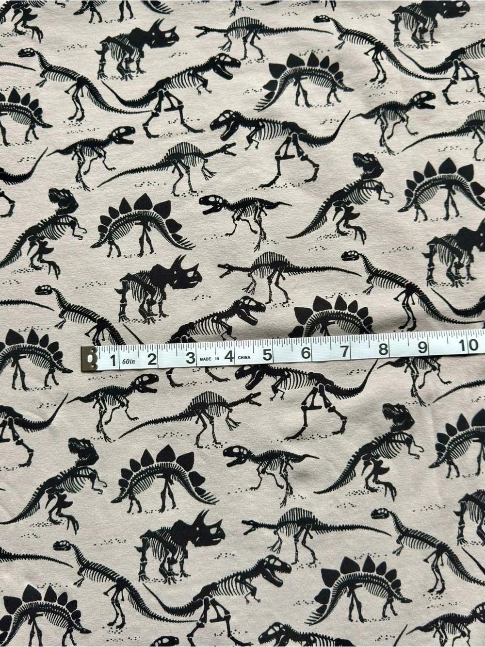 2y euro knit jersey fabric - black dinos on gray